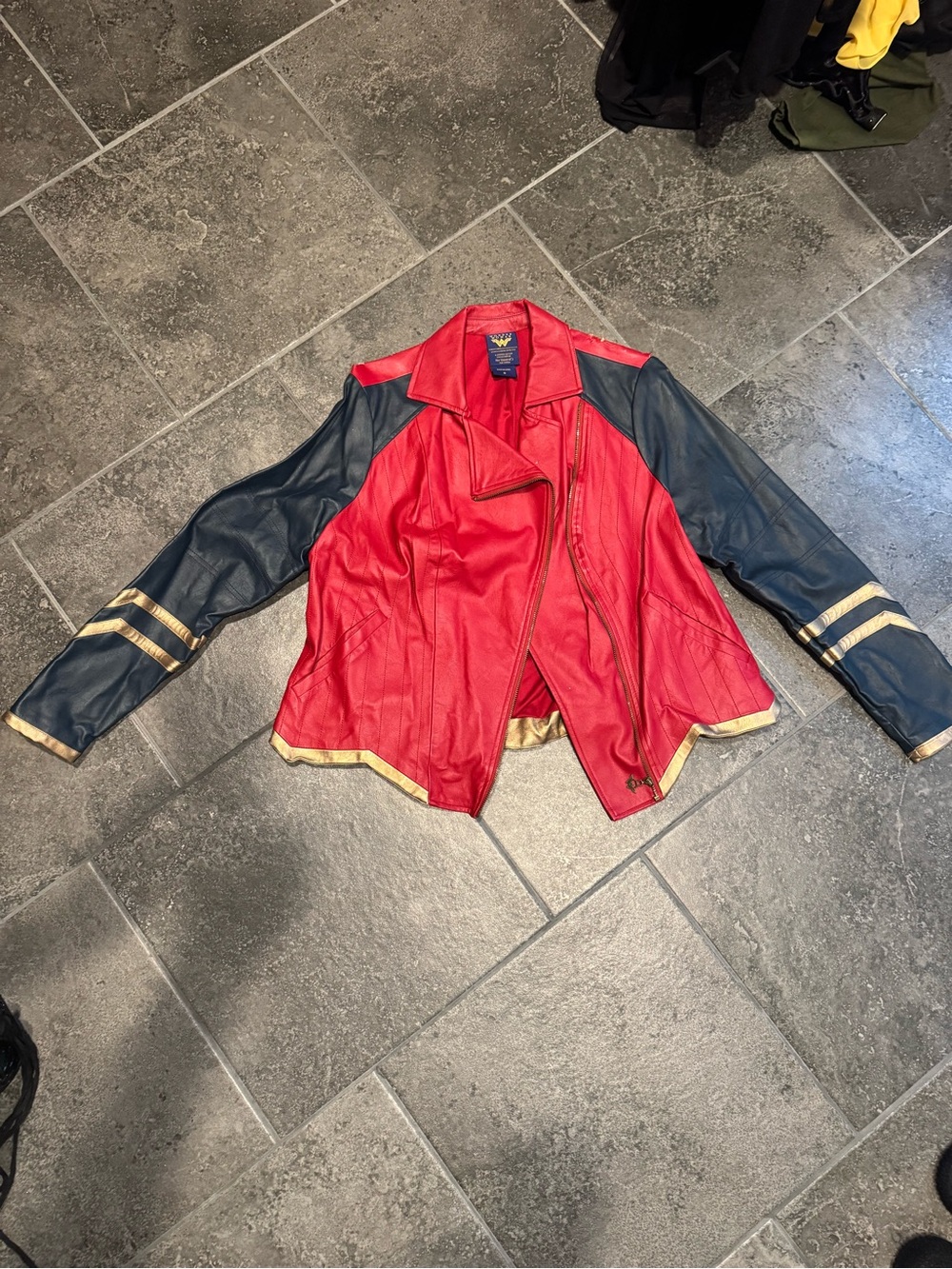 Her Universe Wonder Woman Red and Navy Faux Leather Biker Jacket with Gold Trim
